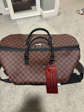 Bape Brown Checked Duffel Bag with Black Handles and Red Tag